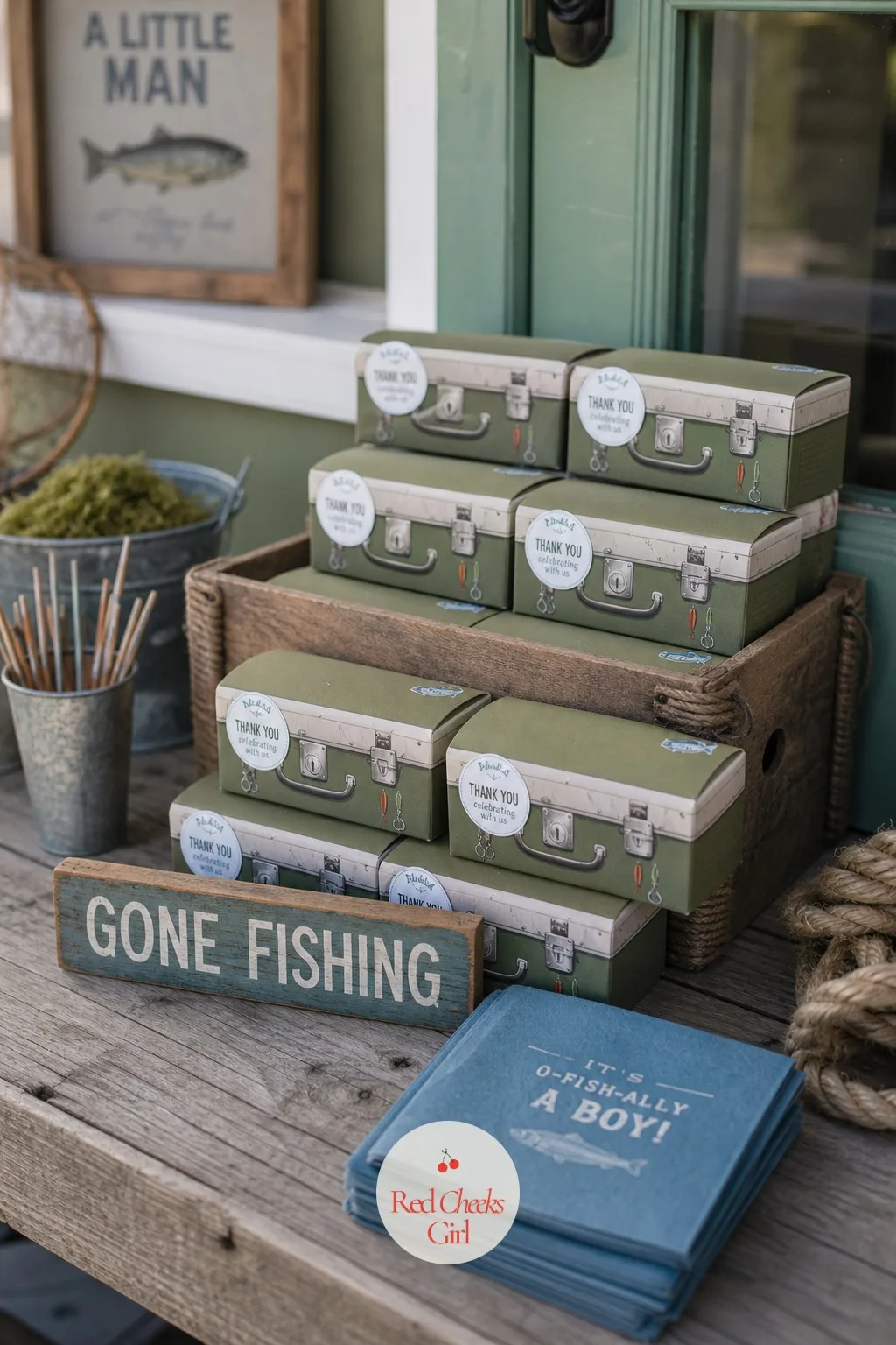 Mini Tackle Box Favor Boxes — Small cardboard boxes printed to look like miniature tackle boxes, each filled with fish-shaped chocolate or a few gummy fish