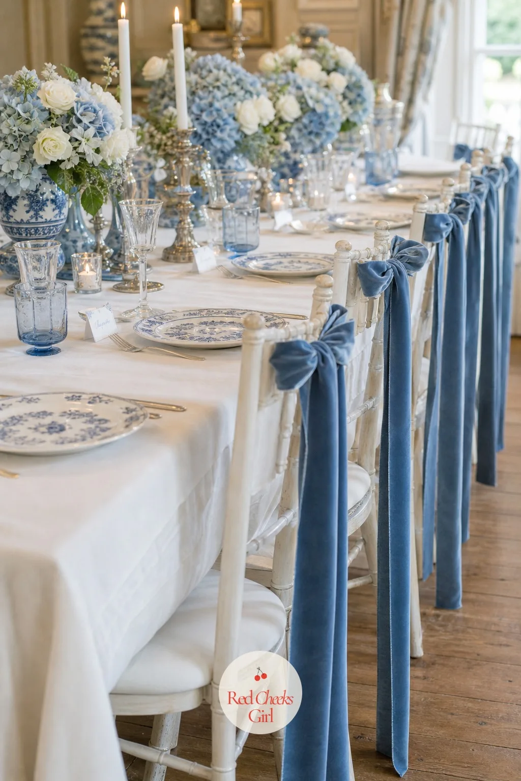 Chairs Tied with Blue Velvet Ribbon — An empty chair back looks unfinished the moment the table is dressed; one length of ribbon tied simply solves it without