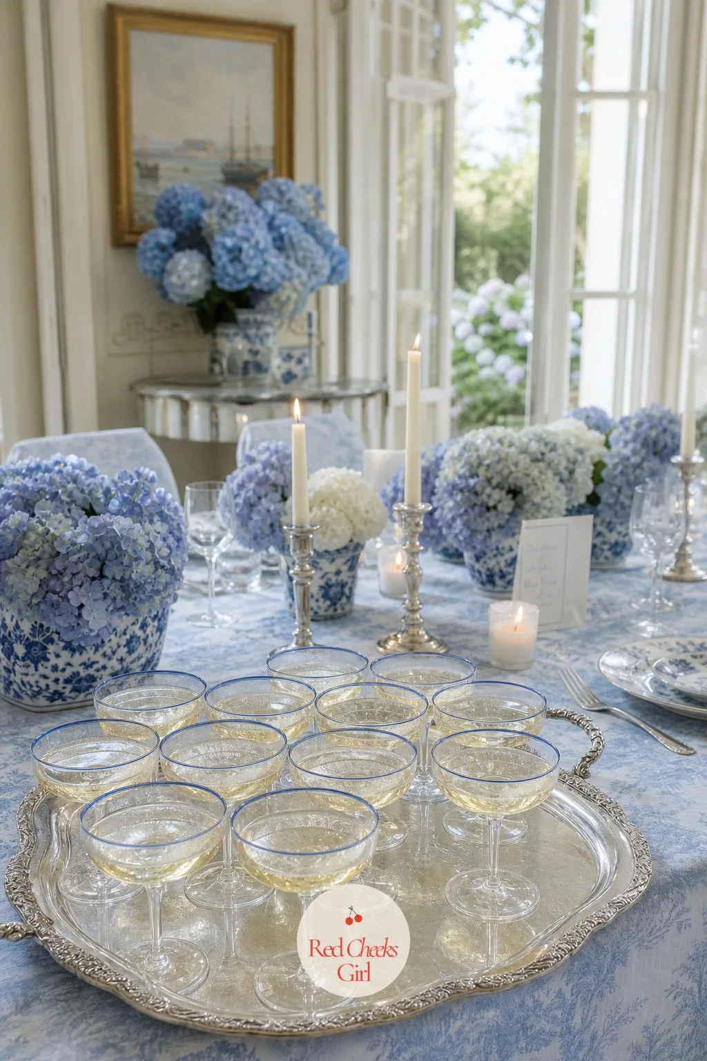Champagne Coupes with a Thin Blue Rim — The toast gets its own object, something that catches the candlelight when two hundred glasses lift at once. French