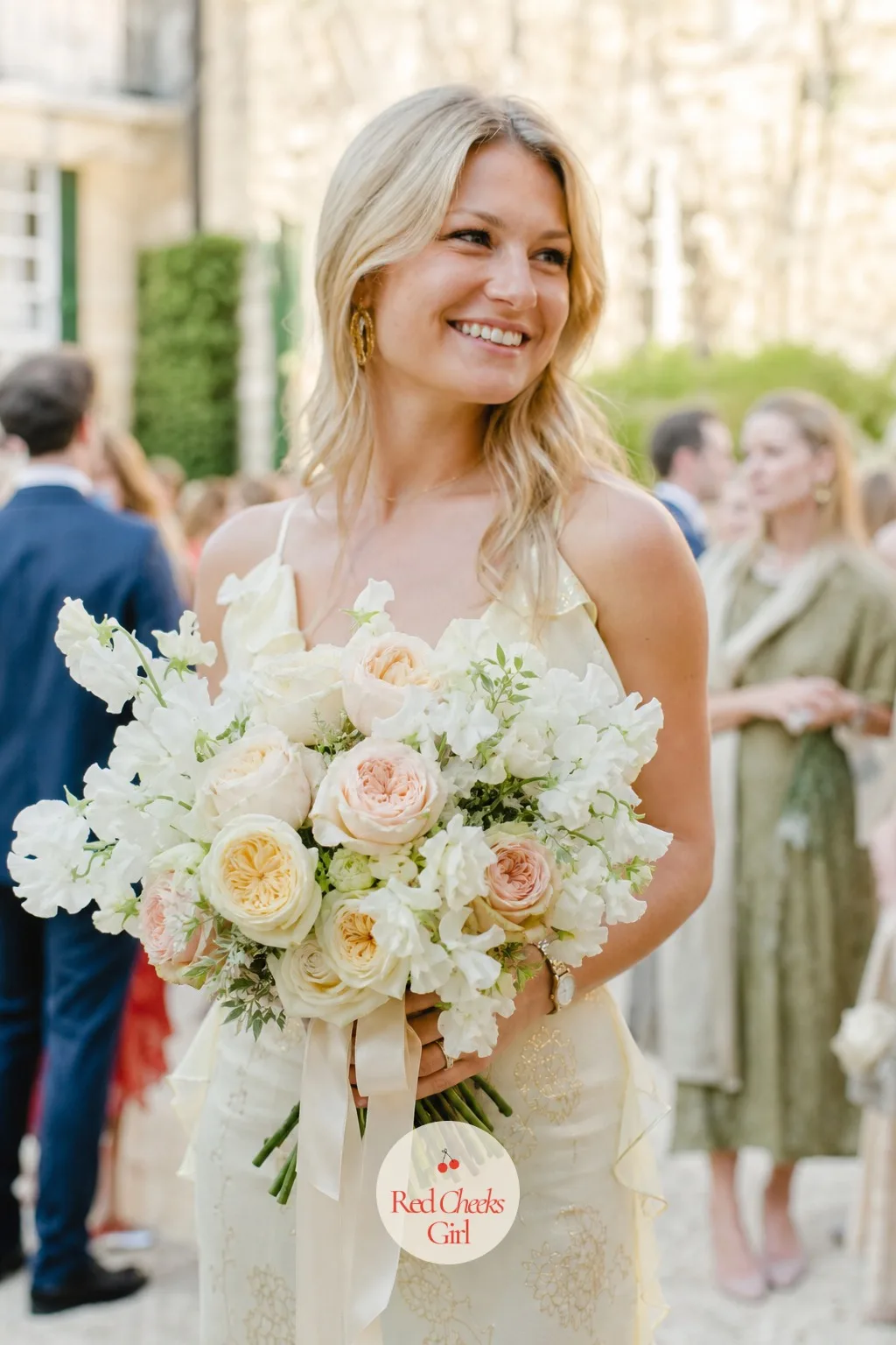 The Bridal Bouquet of Garden Roses and Sweet Peas — Everything else on this list takes its cue from what she is carrying. French chateau wedding