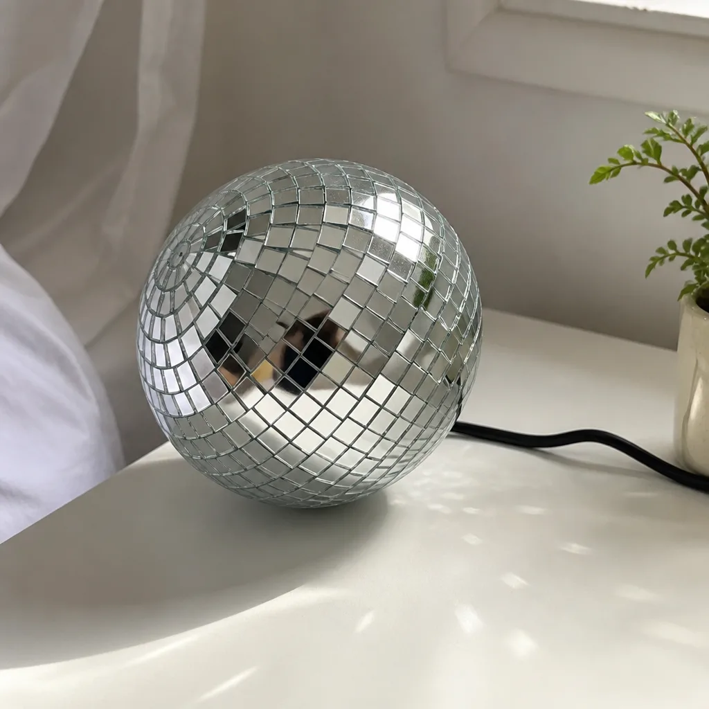 Mini Disco Ball Lamp — A beige cubicle under fluorescent light needs exactly one unreasonable object, and this is it. Funny white elephant gifts