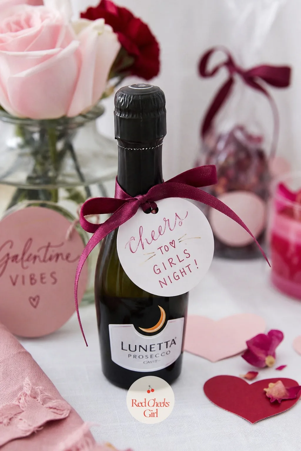 The Mini Prosecco with a Hand Lettered Tag — Nobody objects to a tiny bottle of something bubbly waiting at her seat, it reads as a toast before the toast even