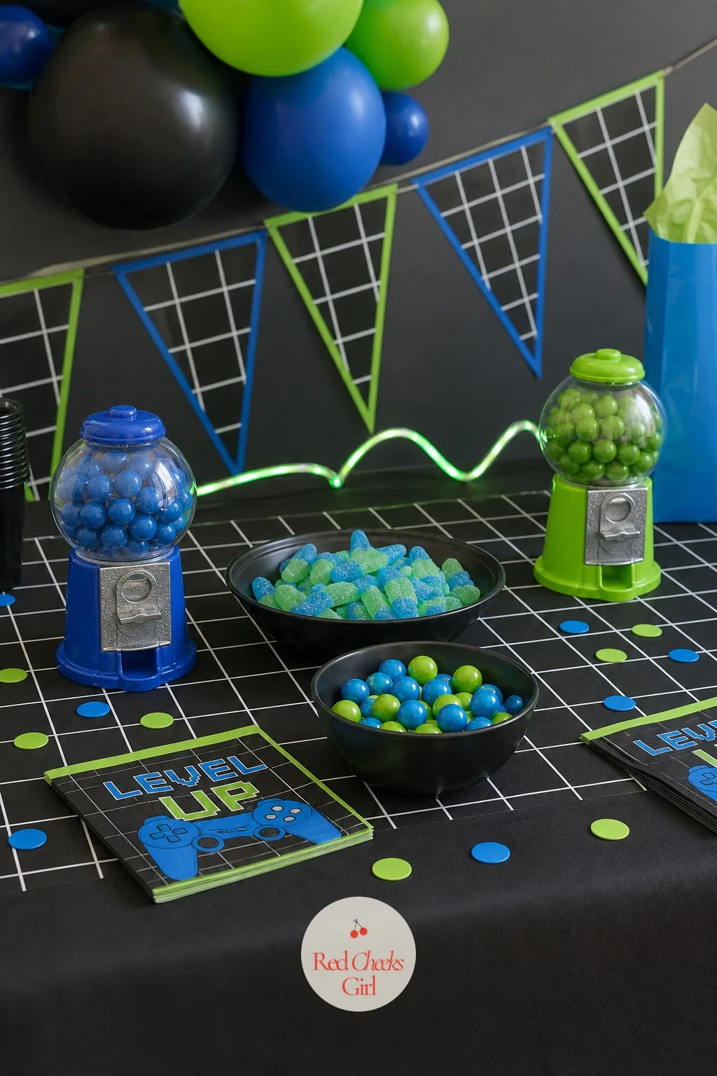 Candy Machines Filled with Blue and Green Candy — A table full of bowls starts to look the same after the third one, which is exactly why this works. Gamer