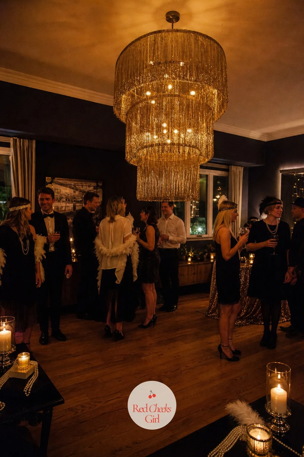 A Gold Fringe Chandelier Over the Living Room — Overhead light does a lot of the mood setting at night, and a bare ceiling bulb undoes everything else in the