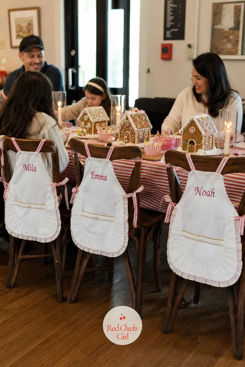 Named Aprons On The Backs Of The Chairs — Tied to the back of every chair, a small apron with the guest's name on it gives the table its personal touch before