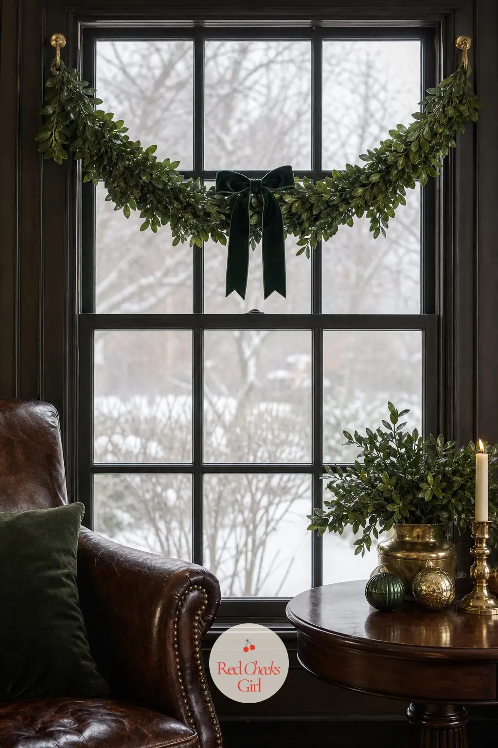 The Library Window, Dressed in a Swag of Boxwood and Brass Hooks — A single window behind the reading chair gets a plain swag of boxwood hung from two small