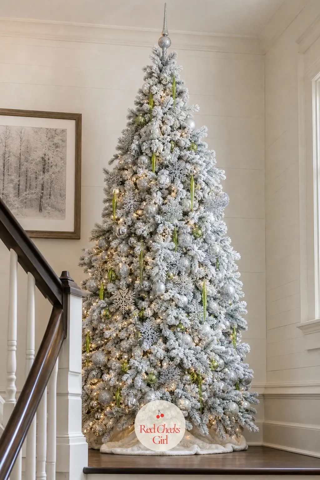 A Snow-Flocked Tree Shaped Like Mount Crumpit — A full, dense artificial tree flocked white rather than lime, broad at the base and tapering like a snow-capped