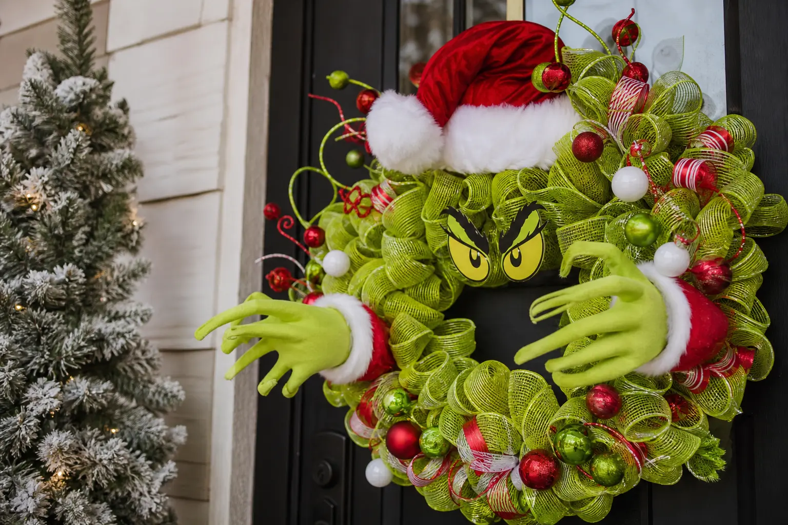 Grinch Wreath Ideas: 11 Lime-Green, Mischievous Wreaths With Furry Hands and Red Santa Hats