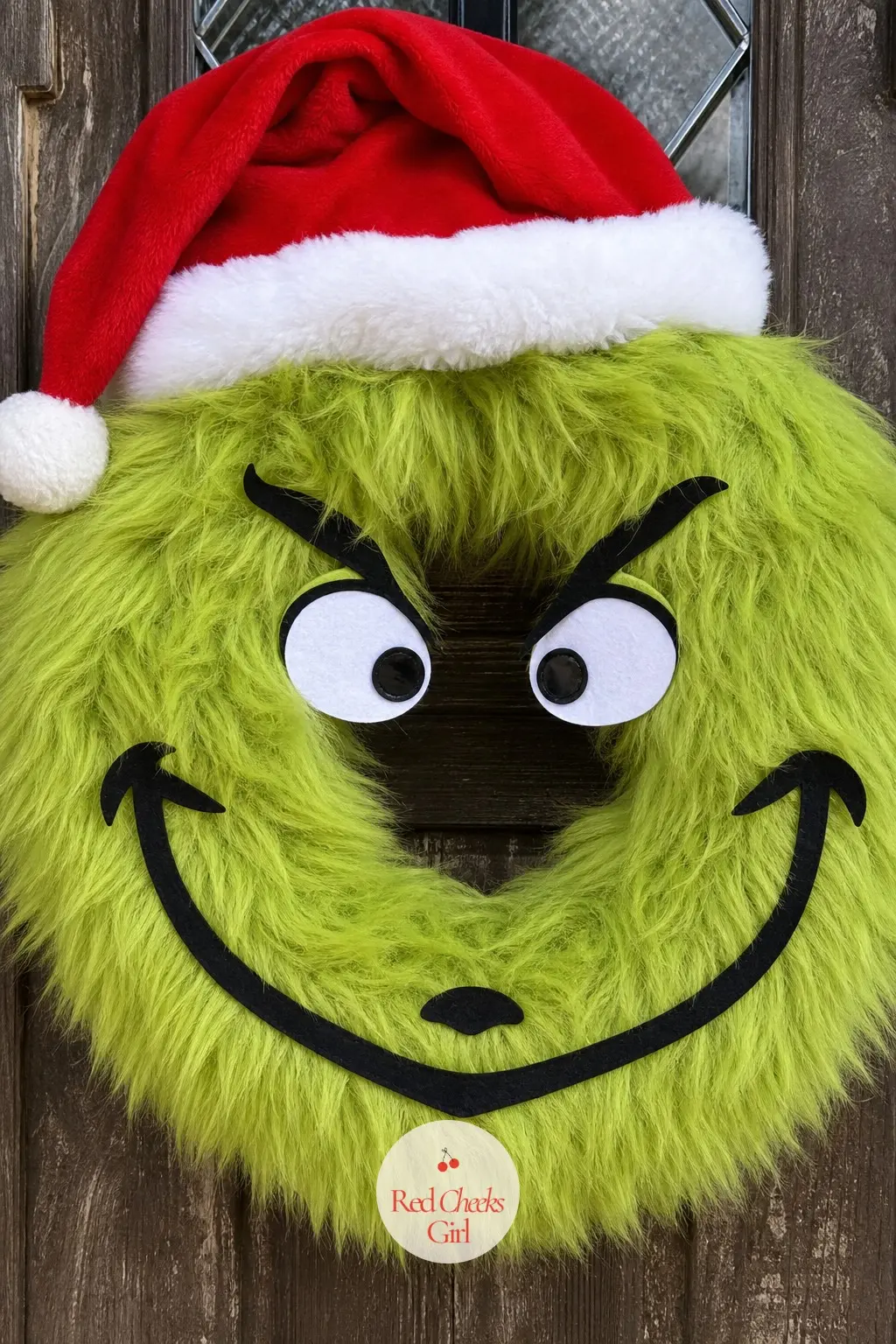 A Lime Green Faux Fur Grinch Face Wreath for the Front Door — This is the wreath people stop their car for. Grinch wreath ideas