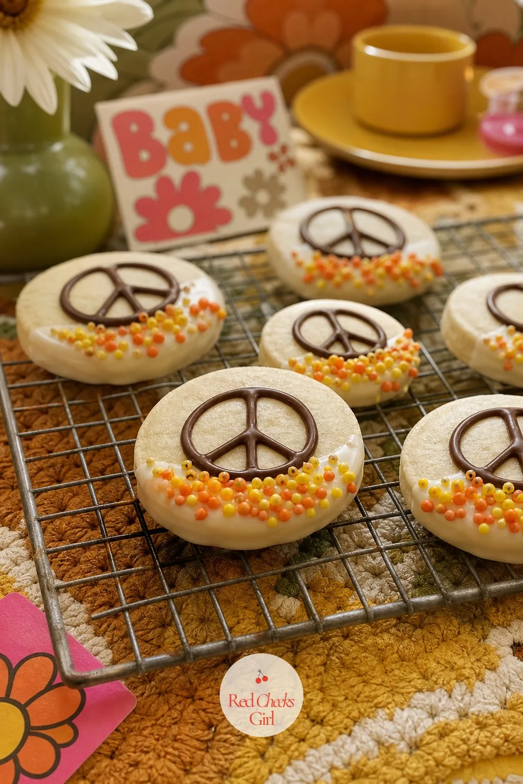 Peace Sign Dipped Cookies — A dessert table reads richer when the shapes vary, not just the colors. Groovy baby shower ideas