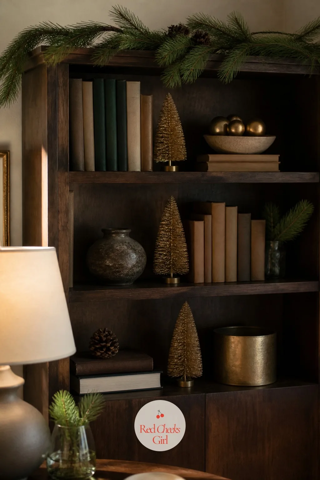 The Bookshelf, Quietly Decked — A bookshelf left exactly as it looks the rest of the year is the one corner guests notice without quite knowing why it reads