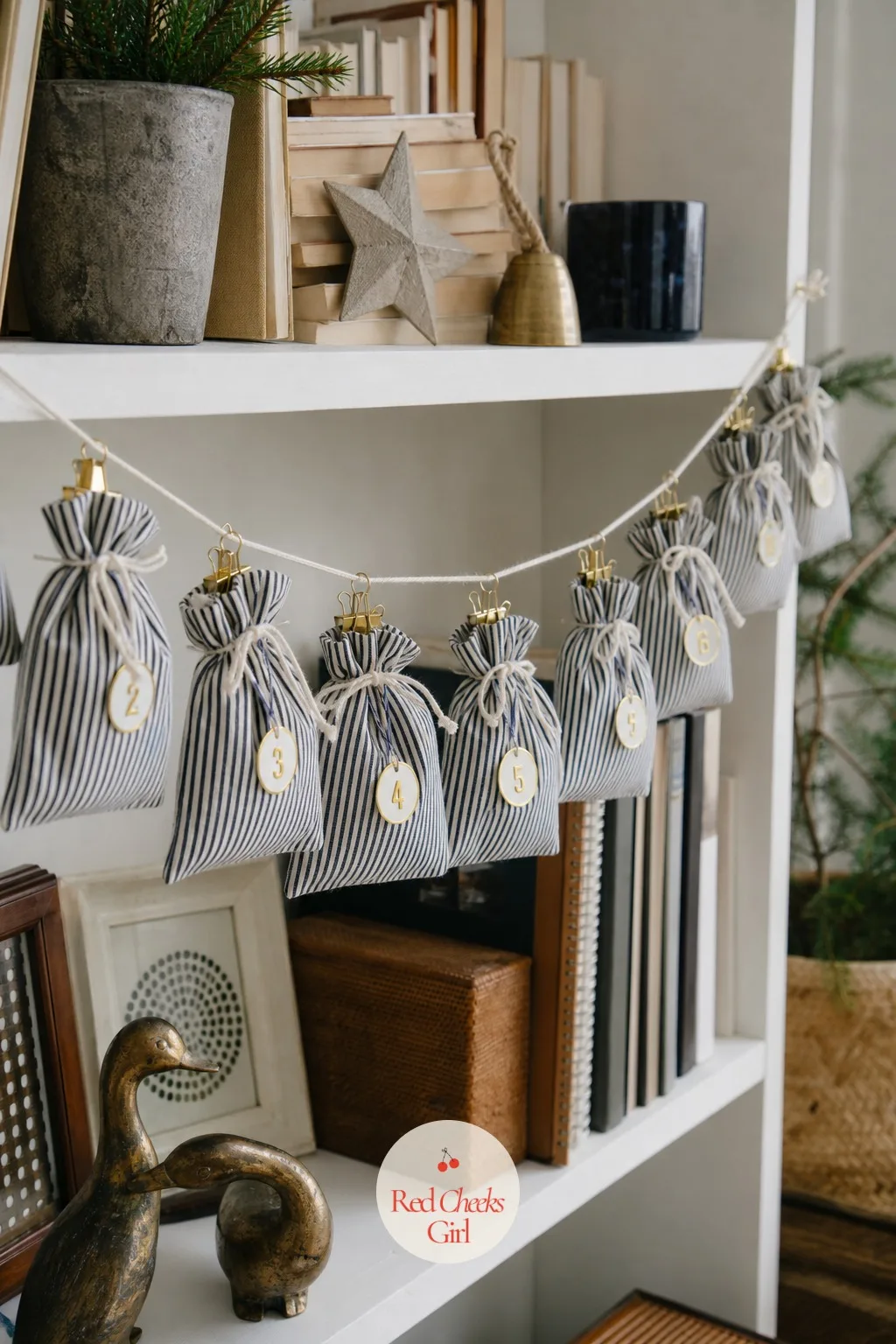 Fabric Drawstring Bag Advent Garland — Not every fabric calendar needs a sewing machine with a free afternoon attached. Handmade advent calendar