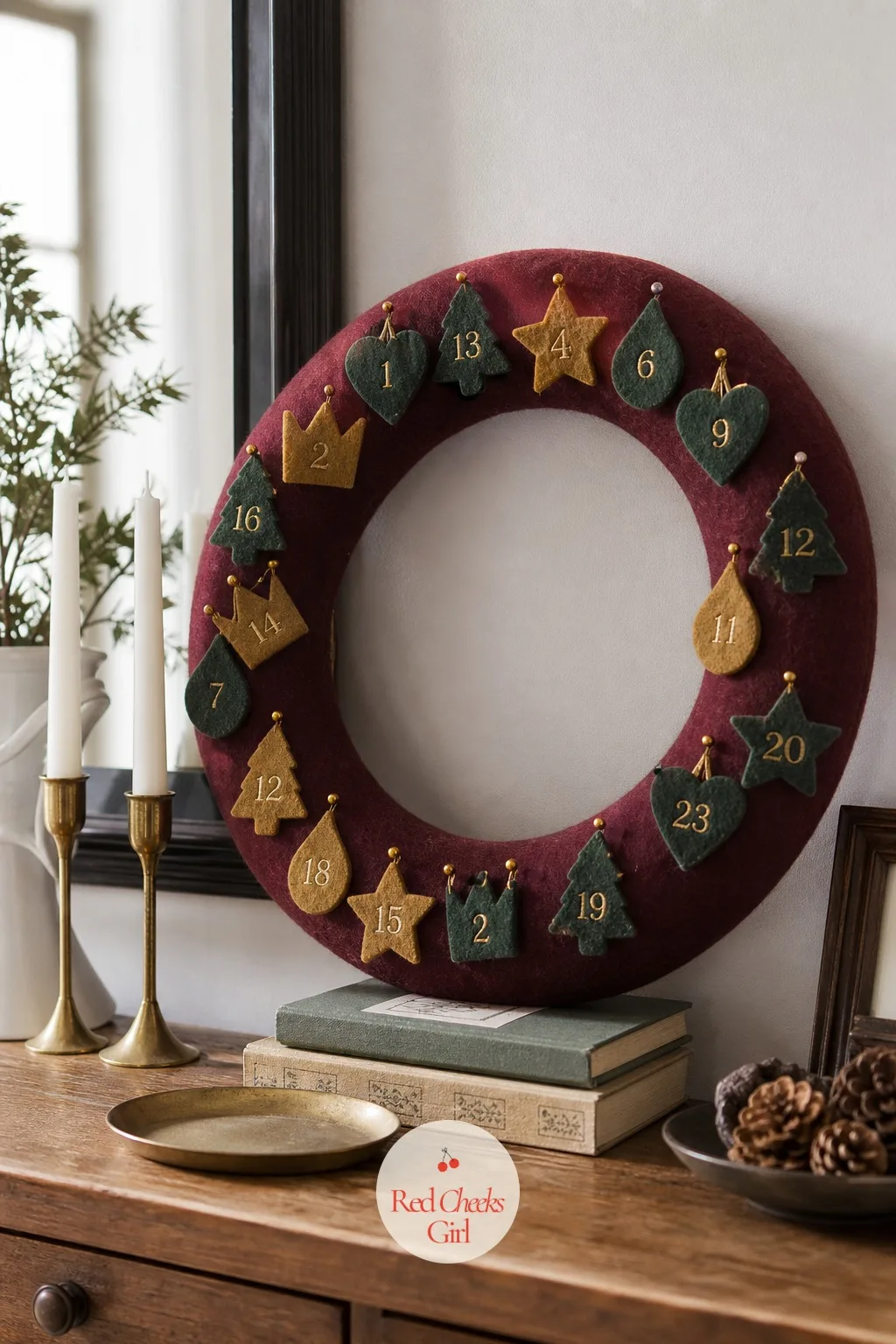 Felt Wreath Advent Calendar with Pinned Ornaments — A wreath that goes up once and comes down on New Year's Day feels like a missed opportunity. Handmade