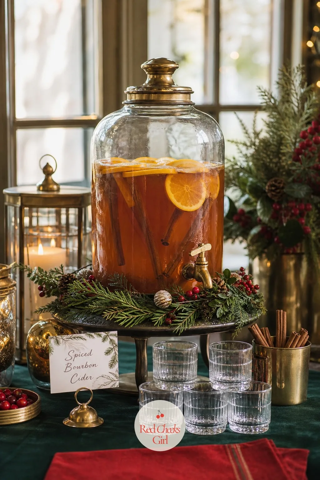 Spiced Bourbon Cider in a Beverage Dispenser — Mixing cocktails to order for three hours straight means missing most of your own party. Holiday open house ideas