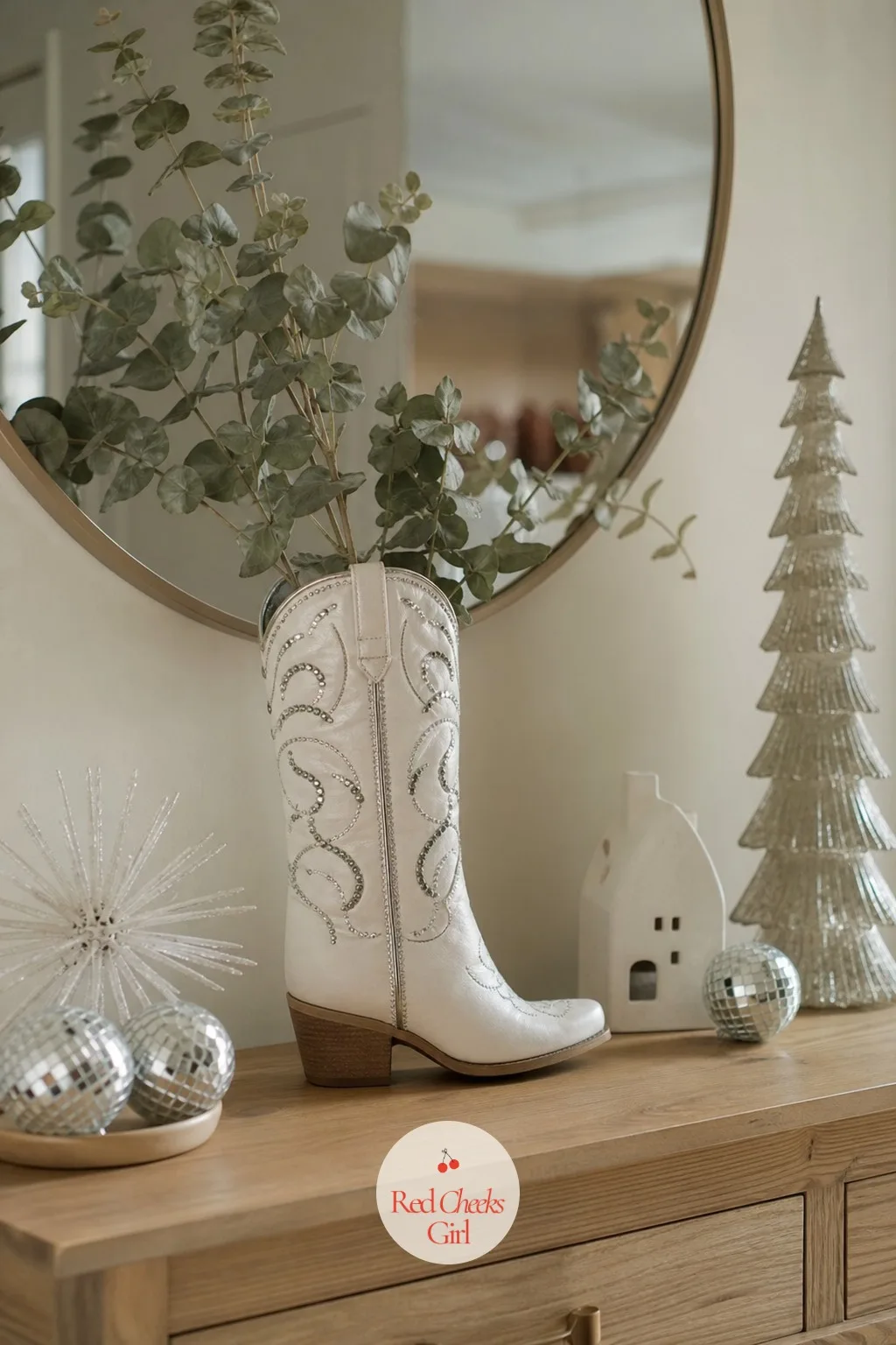 A Boot Used as a Vase — Nobody expects a boot on the entry table, which is exactly why it stops people for a second look. Holly dolly parton christmas