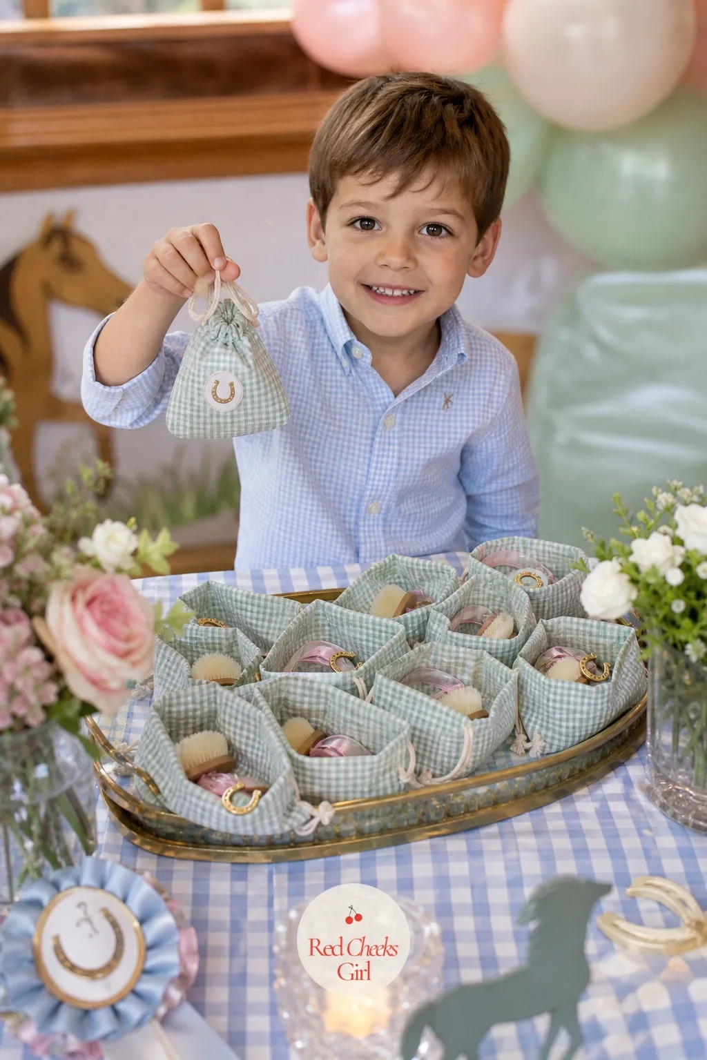 The Little Groom's Kit — Small gingham drawstring pouches sit open on a tray, each holding a soft mini mane brush, a length of ribbon and a small gold