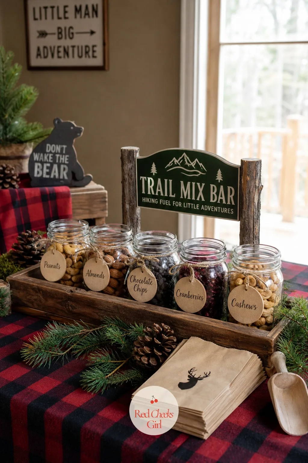 Trail Mix Bar In Mason Jars — Something for people to carry around while they chat keeps the room moving instead of clumping around the gift table. Hunting