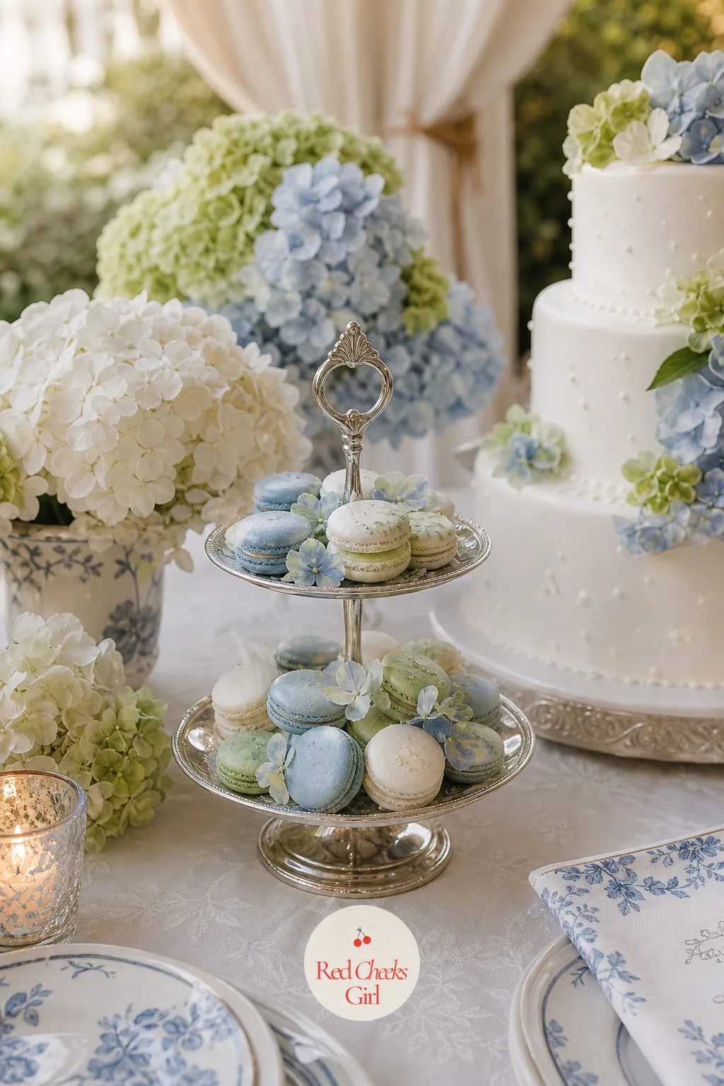 Hydrangea Macarons Beside the Cake — Not every guest wants a slice of cake, and a small sweet in the same three colours gives them something to take from the