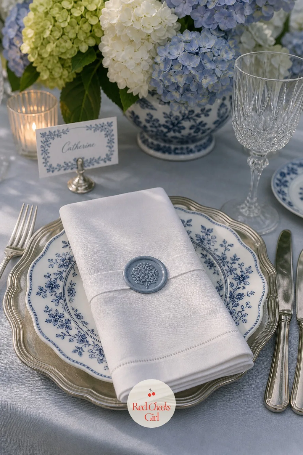 Hydrangea Wax Seals on the Napkins — The smallest detail on the whole table is often the one a guest actually notices, since it is the thing their hands touch