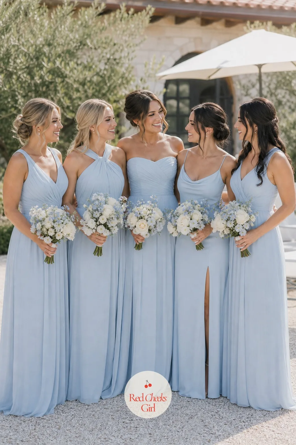 The Bridesmaid Dresses — Matching bridesmaid dresses in a hard, saturated color can fight with a soft palette. Ice blue wedding theme