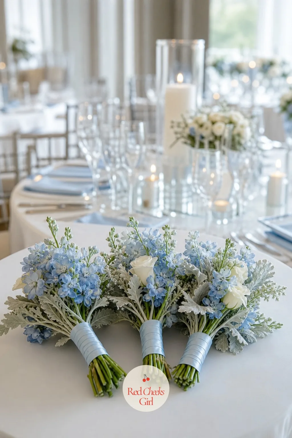The Bridesmaids' Bouquets — Giving the whole bridal party an identical copy of the bride's bouquet flattens the hierarchy in every photo. Ice blue wedding theme