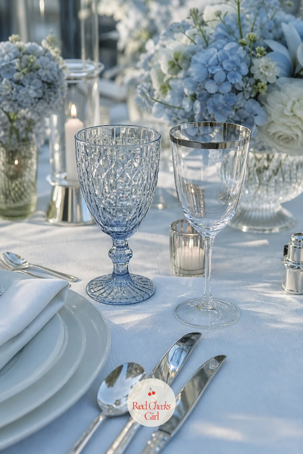 The Glassware and Silver — Clear glass at every place setting is correct but it says nothing about the day. Ice blue wedding theme