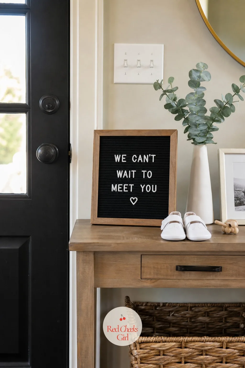 Letter Board Message By The Door — A small felt letter board sits on a console table or shelf, blank or holding an unrelated message all week. Intimate gender