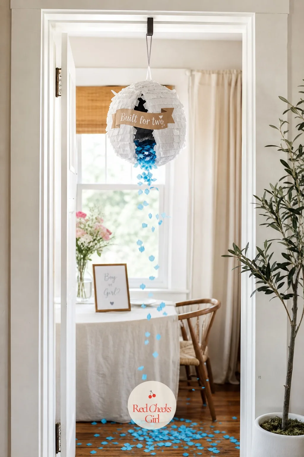 A Mini Piñata Built For Two — A small paper piñata, no bigger than a dinner plate, hangs from a hook in the doorway between your kitchen and living room.