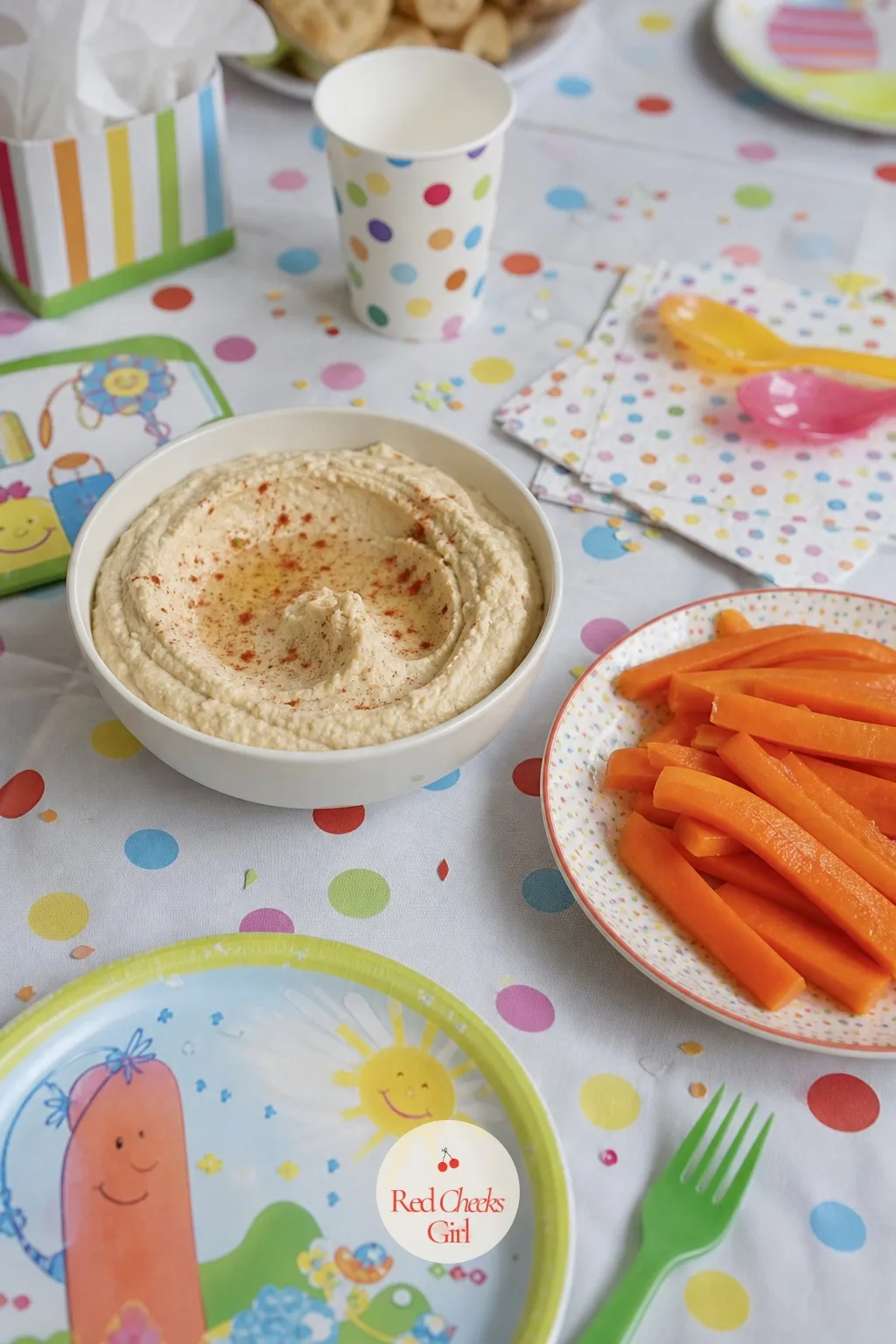 Plain Hummus with Soft Dipping Vegetables — Raw vegetables alone get ignored on sight; a dip changes the whole mood of the plate. Iron rich foods for kids