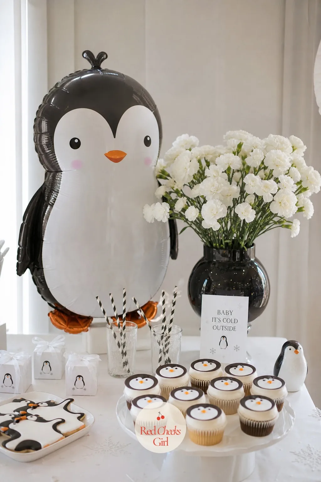 Baby Penguin — Black and white does a lot of heavy lifting here, so let the penguin show up once, somewhere unexpected, rather than on every napkin. January