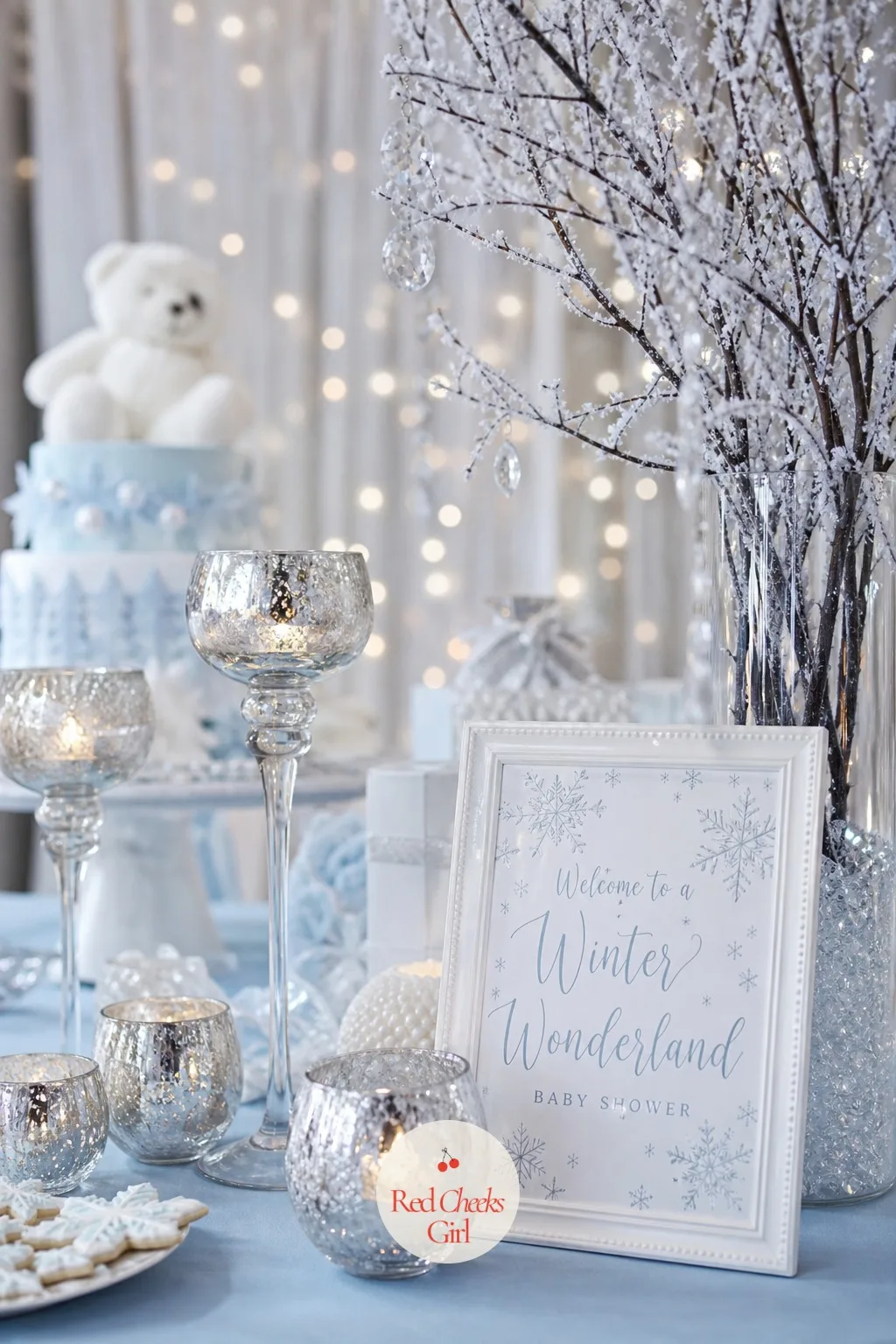 Winter Wonderland — White-on-white can look flat under ordinary bulbs, which is the real objection to this one. January baby shower themes