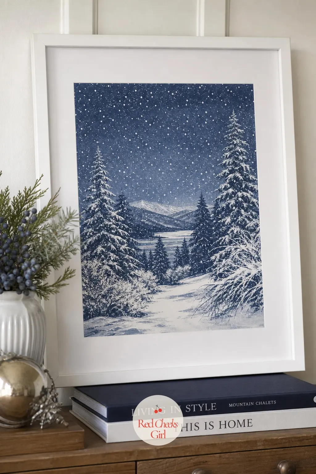 A Framed Snow Scene Print Leaned Against the Wall — Rather than hanging new art, lean a single framed snow scene print against the wall on top of the dresser