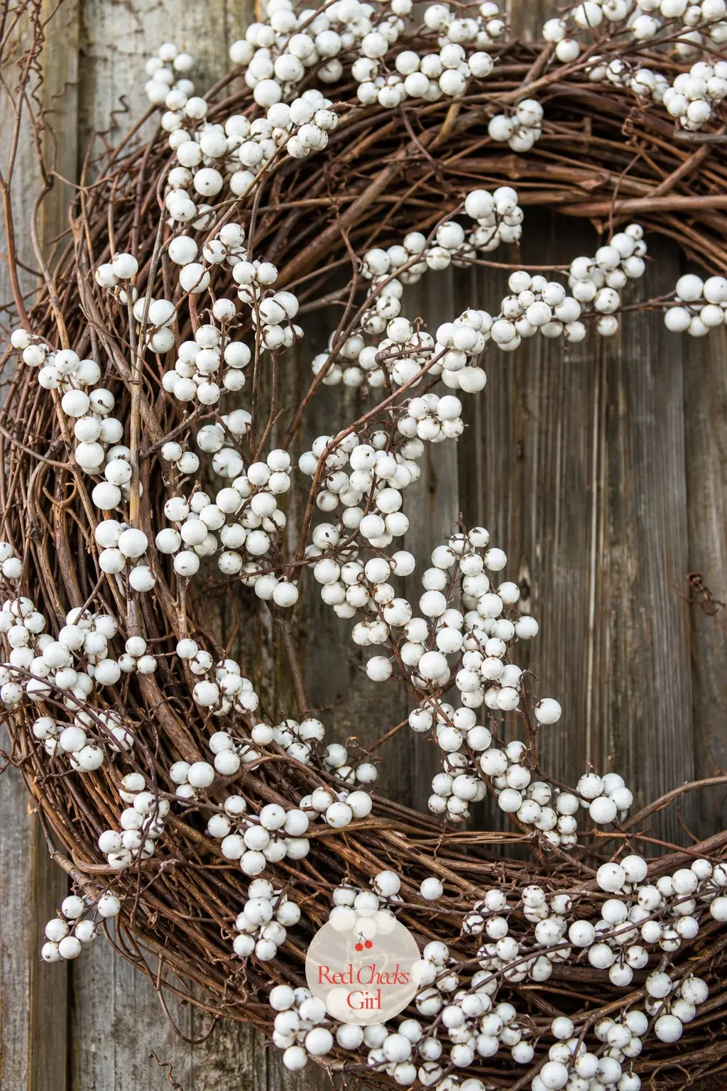 The Grapevine and Snowberry Wreath for the Garden Gate — Clusters of soft white snowberries against a loose, bare grapevine base keep things simple and a