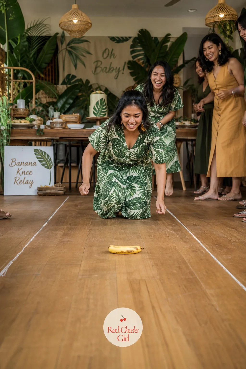 Banana Knee Relay — Nobody forgets the banana relay, mostly because of how undignified it looks and how hard everyone laughs doing it anyway. Jungle theme baby