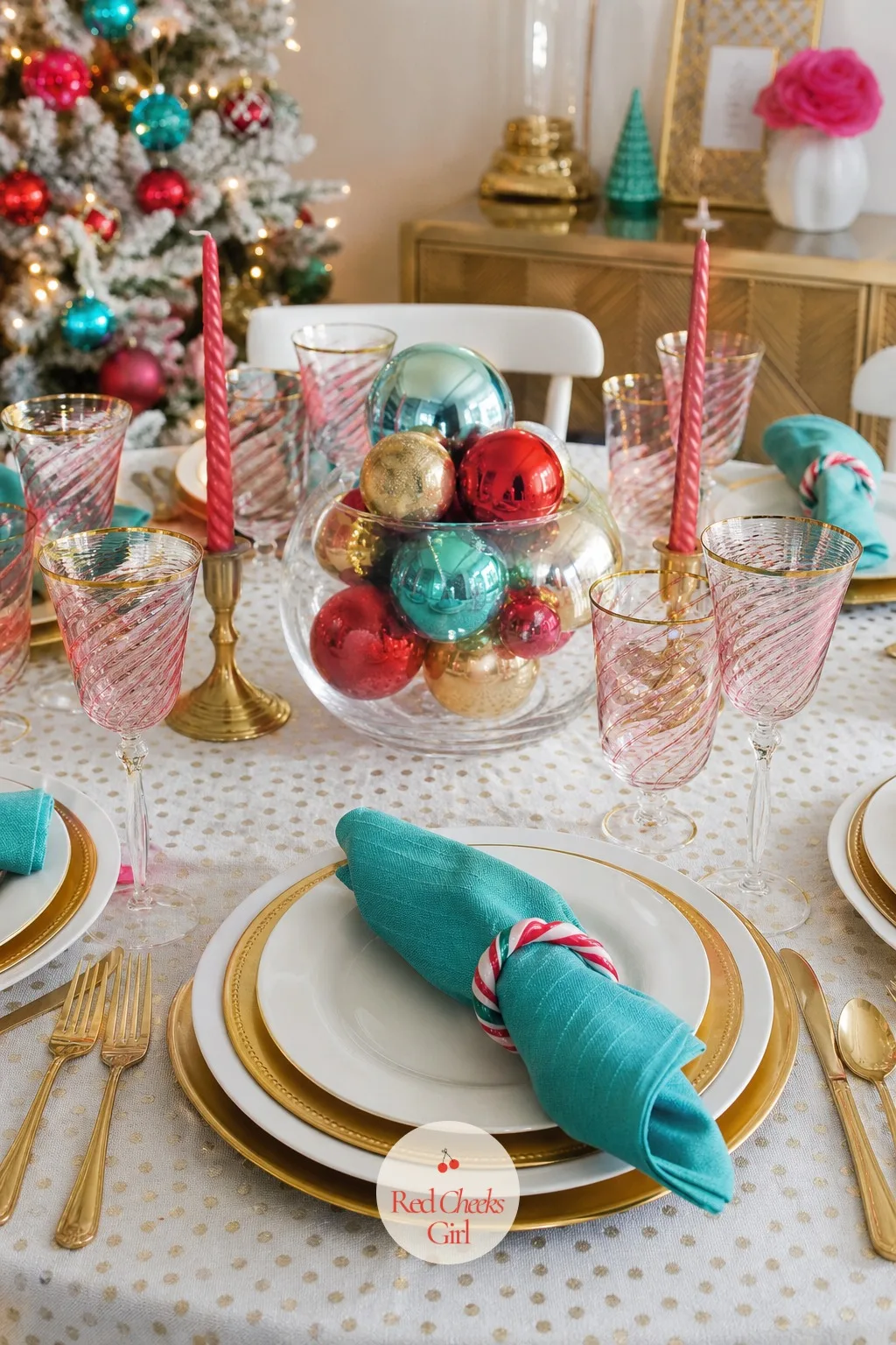 Dining Table Set With a Gold Charger, Glass Ball Centerpiece and Candy Cane Napkin Rings — A dinner table does not need height to feel festive, just the right