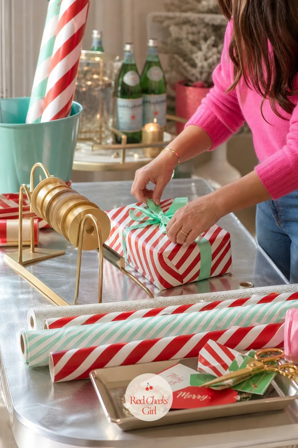 Gift Wrap Station With Candy-Striped Paper and Gold Ribbon Rolls — Last minute wrapping always happens somewhere in the house. Kitsch christmas