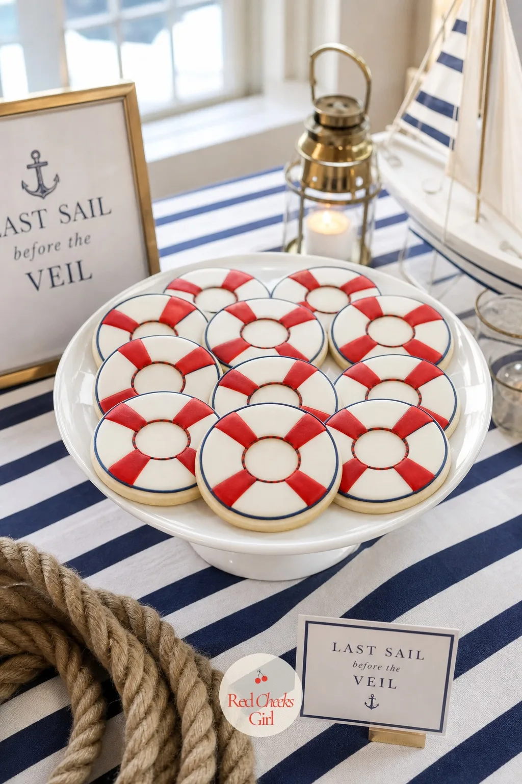 Lifebuoy Sugar Cookies — Next to the cake, a tray of lifebuoy cookies gives the motif a second, smaller life. Last sail before the veil bachelorette