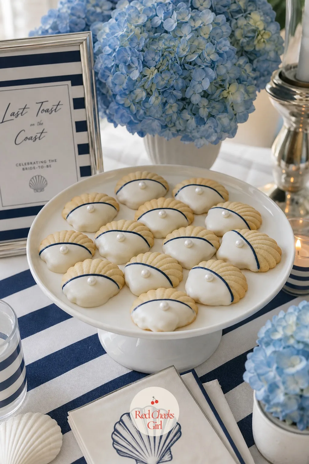 The Shell-Shaped Butter Cookies — Next to the big cake, a small plate of cookies gives guests something to take with their coffee without cutting into the main