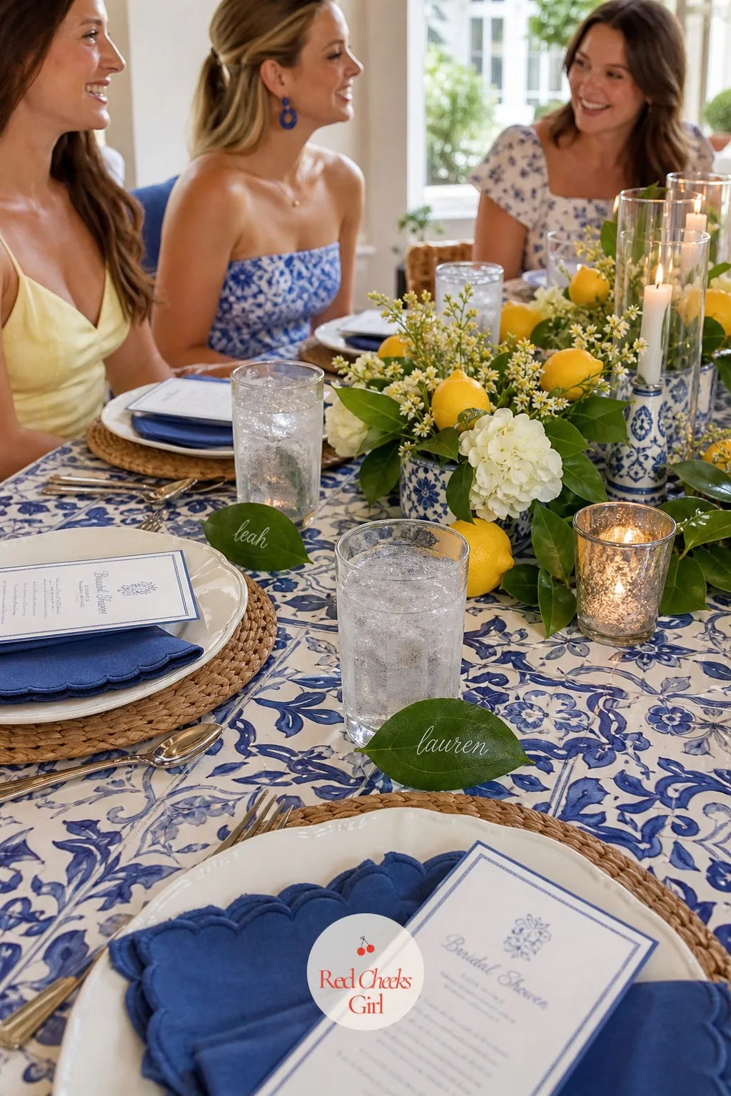 Lemon Leaf Place Cards at Each Seat — Guests still need to find their seat, and a plain printed card feels thin against everything else on this table. Lemon