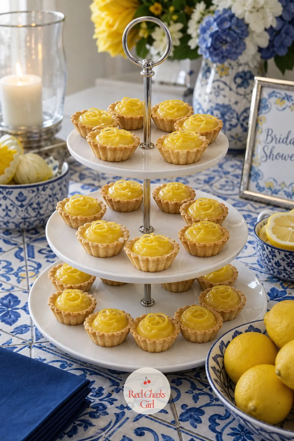 Mini Lemon Tarts on a Tiered Stand — The dessert table needs some height, and a tiered stand filled with mini lemon tarts does that without adding a single new