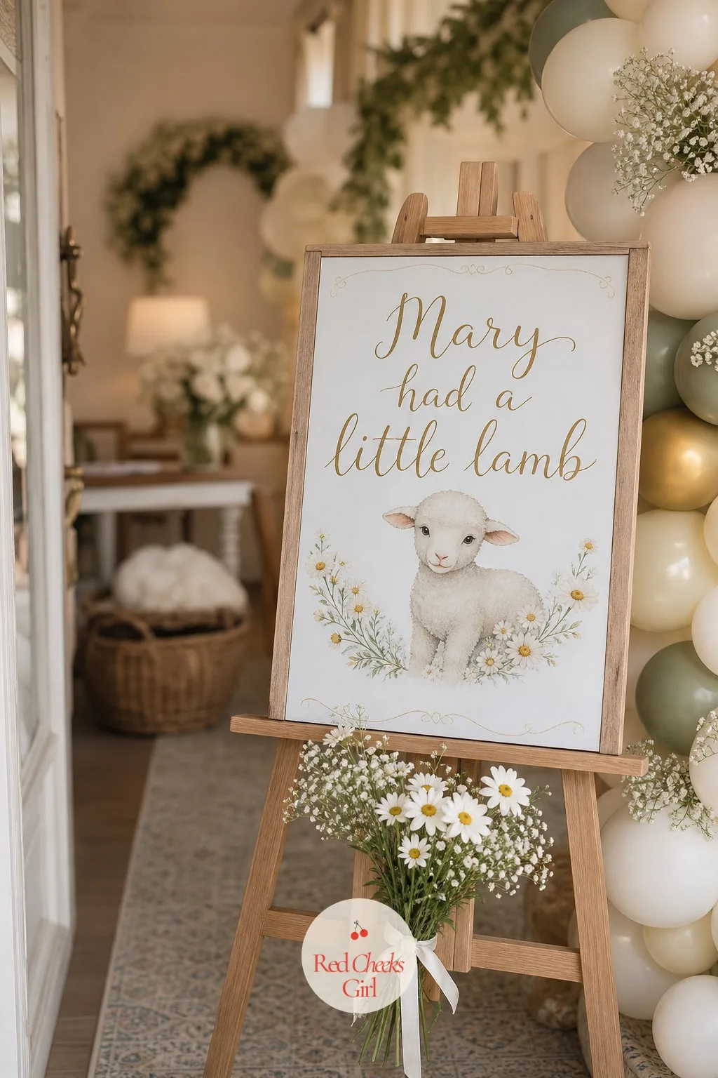 'Mary Had a Little Lamb' Welcome Sign — A wooden easel sign greets guests at the door with the opening line of the rhyme hand lettered in gold, a small painted