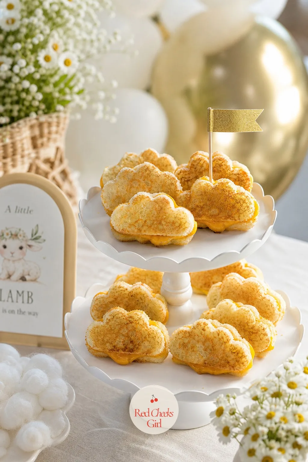Mini Cloud Grilled Cheese Bites — Small grilled cheese sandwiches, cut with a cloud shaped cutter rather than a plain square, stack on a tiered stand with a