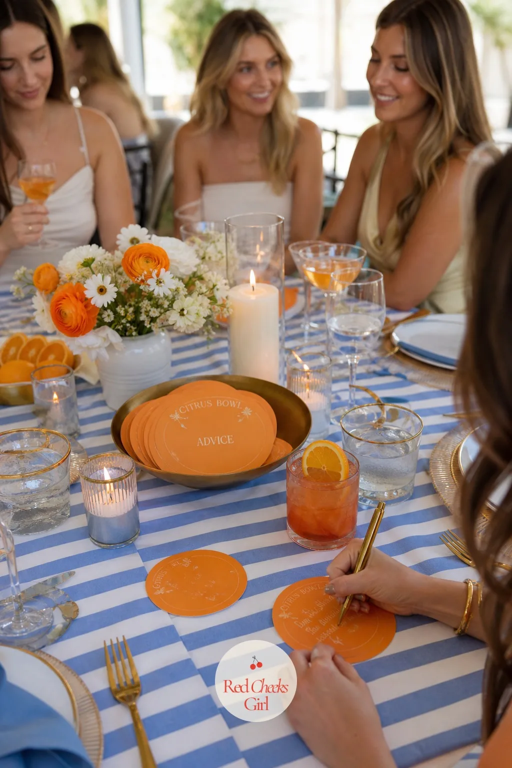 The Citrus Bowl Advice Cards — Set beside the centrepiece rather than at a separate station, this folds advice-giving into the table itself: a shallow brass