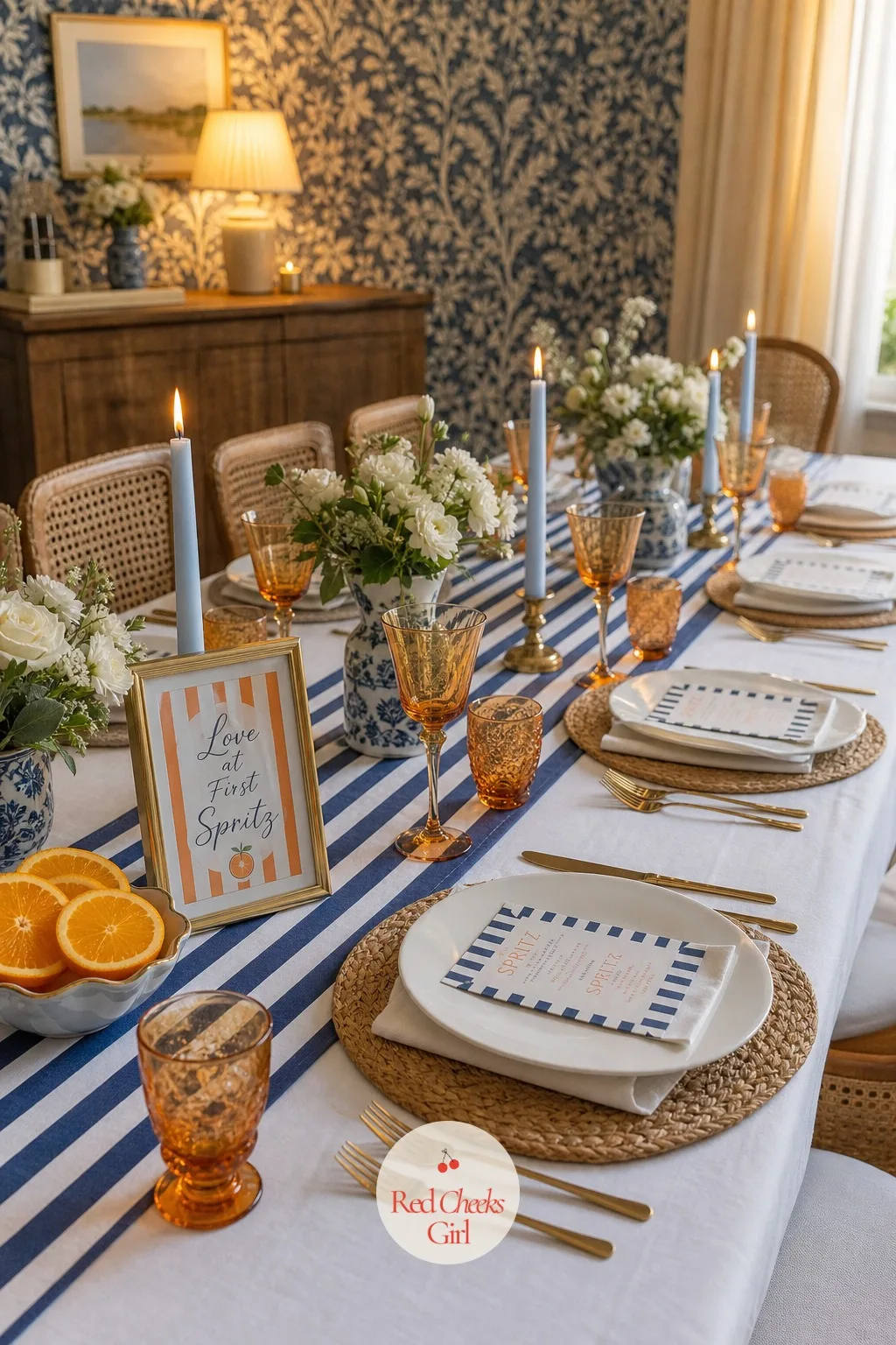 The Orange and Blue Tablescape — This is the table everyone sits down to for cake and antipasti, and it should read as one continuous idea from the cloth up: a