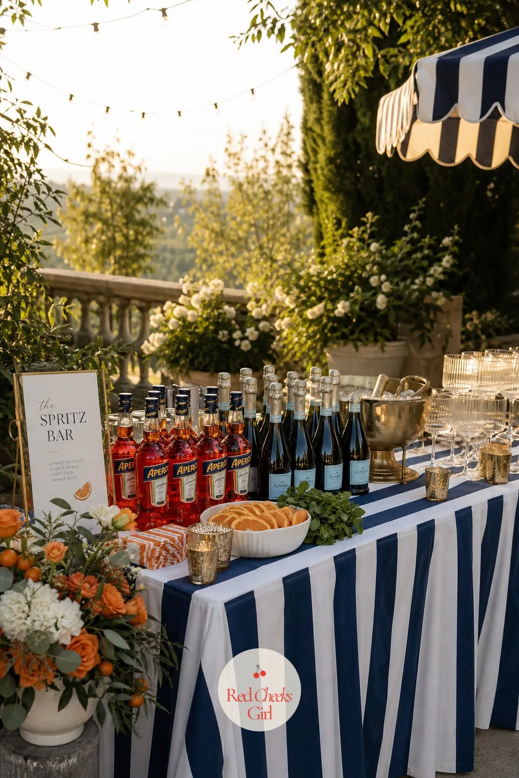 The Spritz Bar — She would say a drinks table is just a drinks table, until she sees this one: a long table against a sun-warmed wall, draped in a
