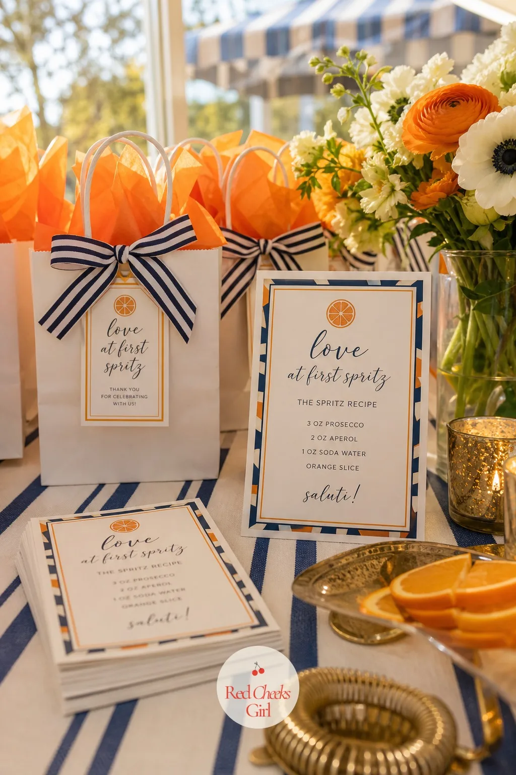 The Spritz Recipe Cards to Take Home — Tucked beside the favour bags, this is the one keepsake guests actually use again: a small printed card with the exact