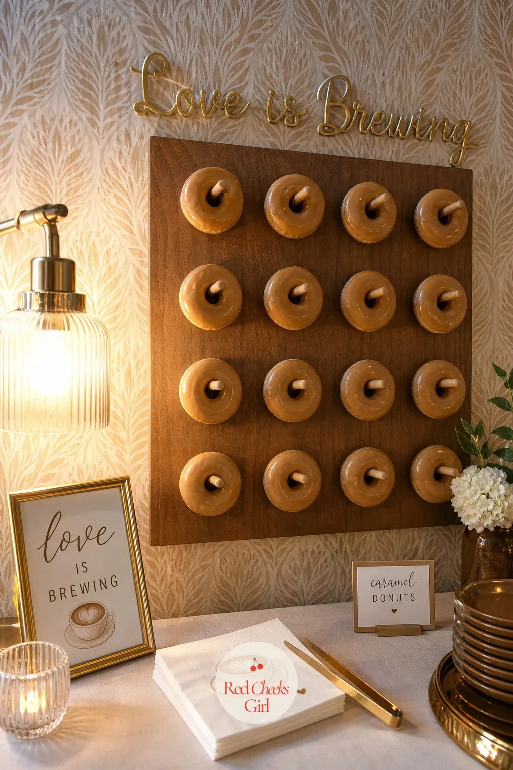 Donut Wall — Guests reach for these before anything else, and a wall gives the whole table height it would not otherwise have, without crowding the pastries