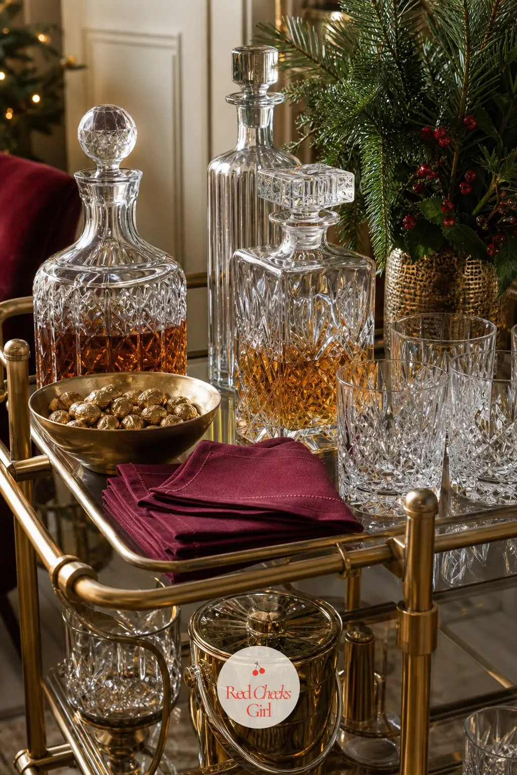 A Bar Cart Playing Lobby Lounge — A brass bar cart holds cut crystal glasses, a decanter, and a small dish of gilded nuts, styled the way a hotel bar keeps
