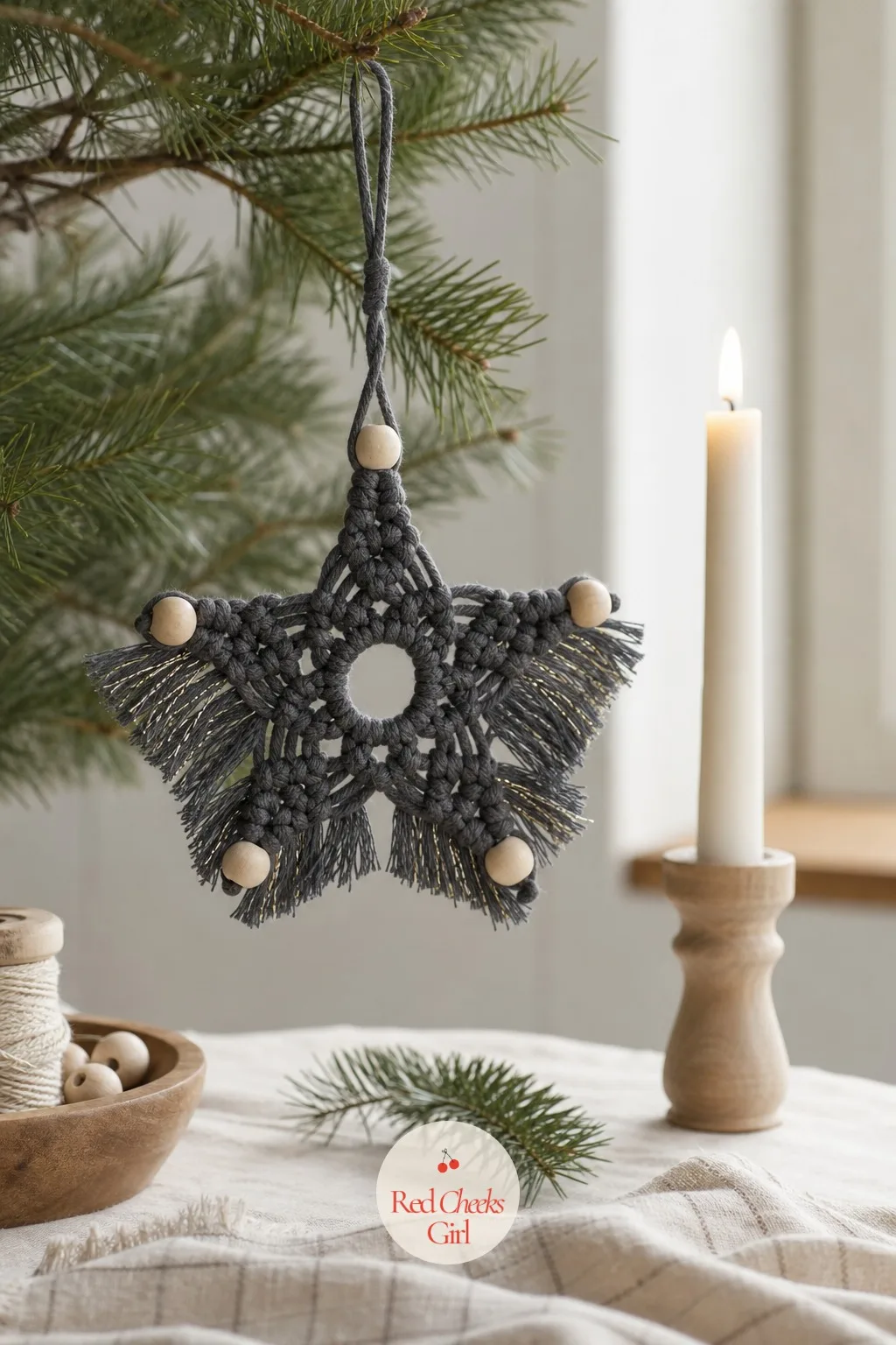 Fringe Star Ornament — Where the tree ornament is all clean lines, this star leans into texture: a wood bead sits at each of the five points, and loose cord