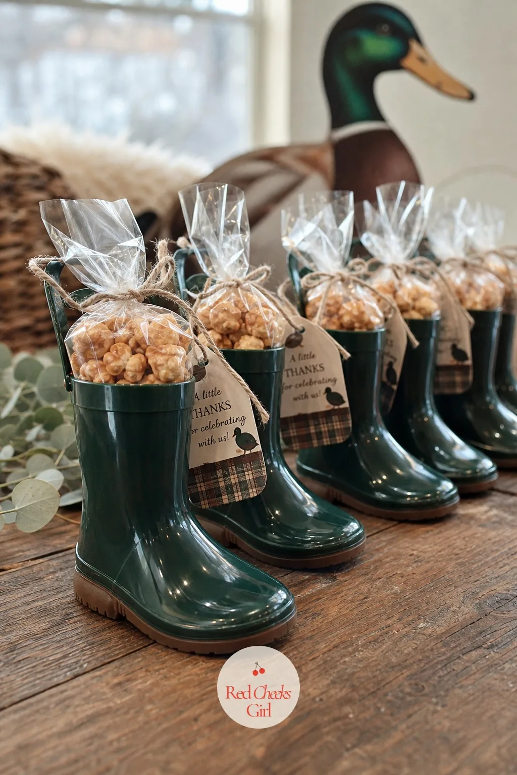 Rain Boots Filled with Caramel Corn and Cider Mix — A candle in a jar is the favor everyone has already got three of at home. Mallard duck baby shower ideas